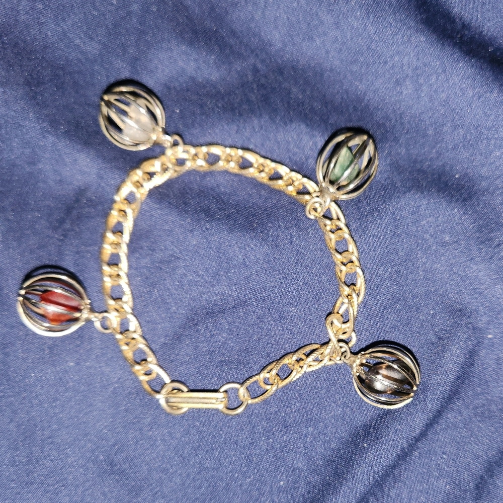Elegant Gold Charm Bracelet with Accents